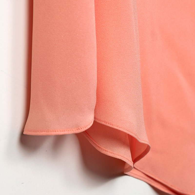 【季芹私服】MOMA 粉橘色珠鍊滾邊領口不對稱設計長版上衣-2