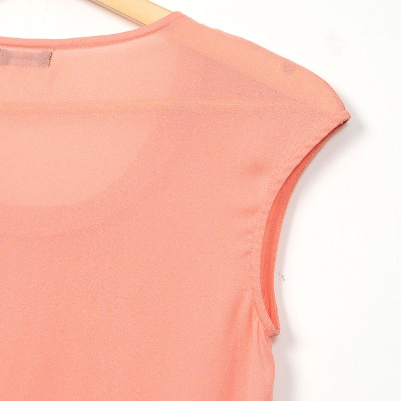 【季芹私服】MOMA 粉橘色珠鍊滾邊領口不對稱設計長版上衣-3