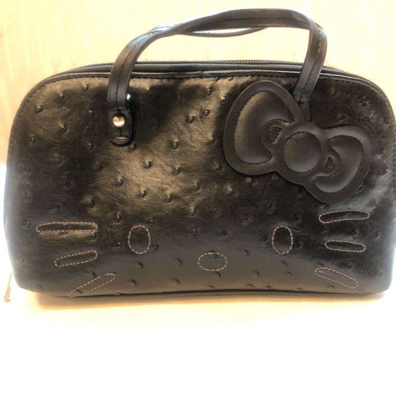 正版三麗鷗 Hello Kitty 黑色 手拿包 小包 二手-0