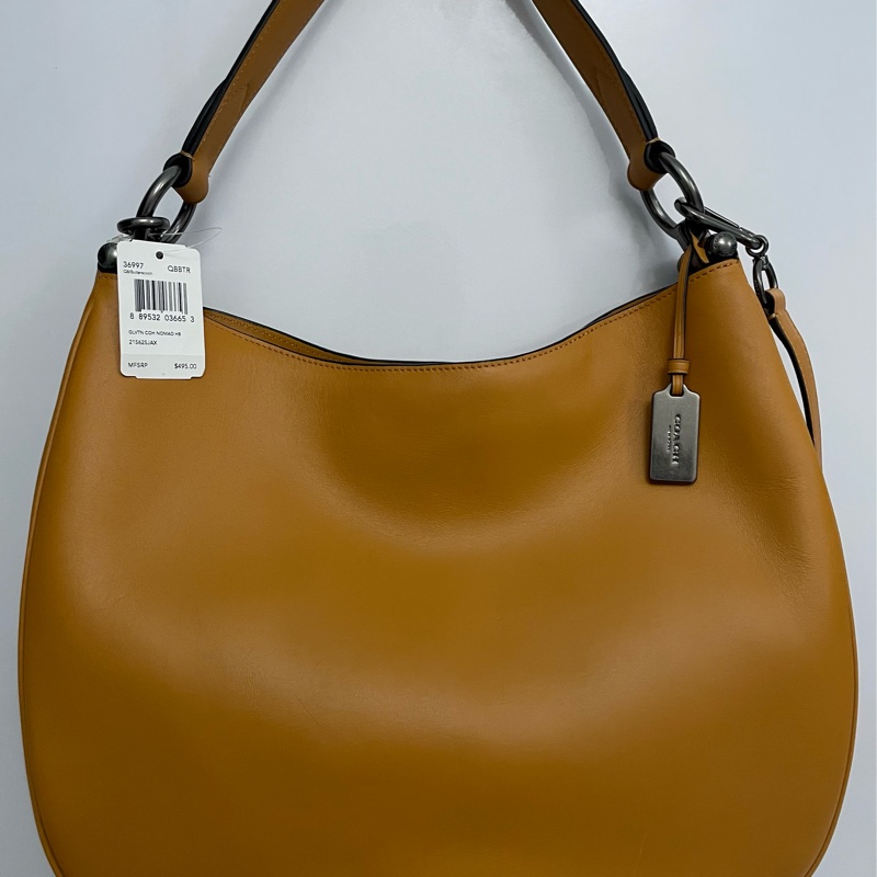 美國正櫃coach半月包-0