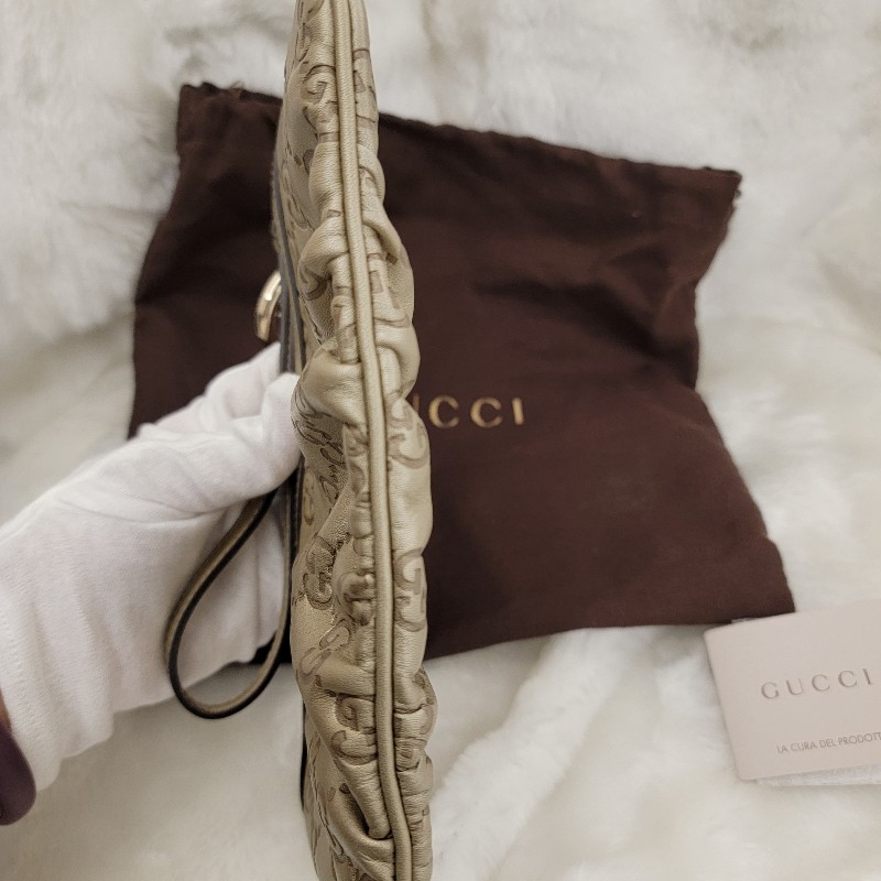 GUCCI牛皮壓紋金釦拉鍊手拿包/晚宴包-4