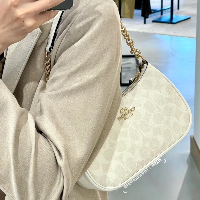 coach teri冰川白 腋下包-1