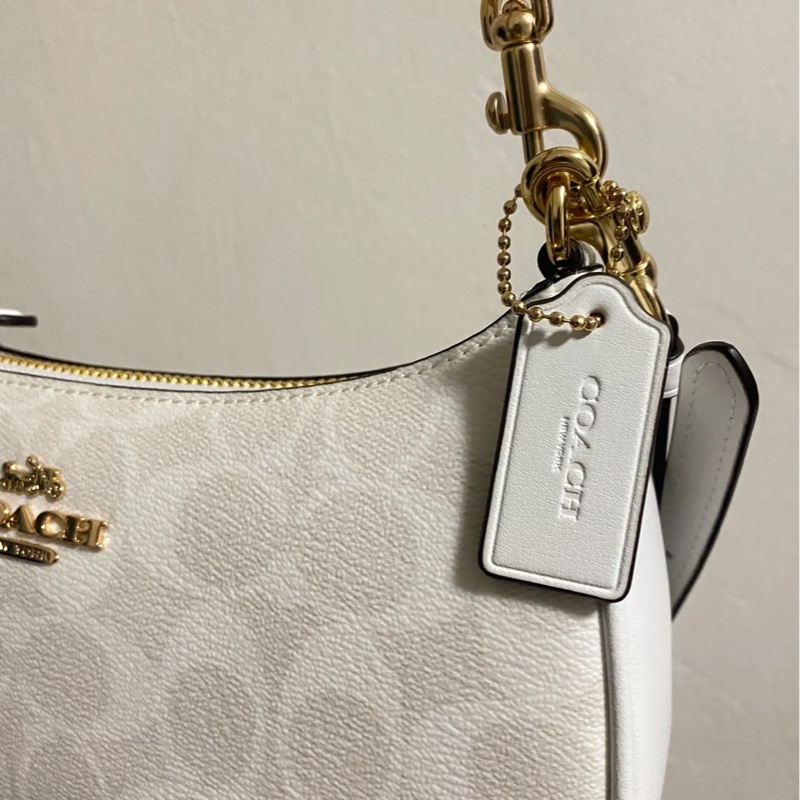 coach teri冰川白 腋下包-4