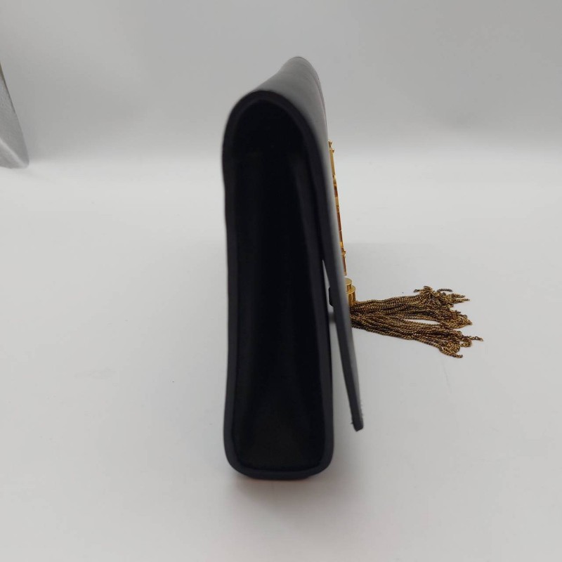 二手（有使用過痕跡）YSl 黑色牛皮晚宴手提包，
此晚宴手提包，採用吸扣開合，SAINTLAURENT PARIS標誌。
MONOGRAM SAINT LAURENT手拿袋，綴以互鎖金屬YSL標誌。-57