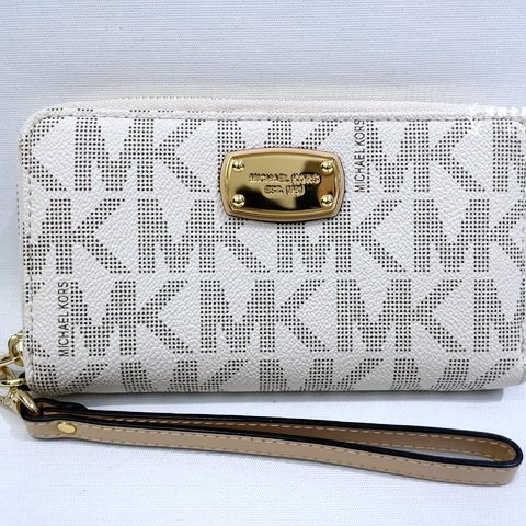 MK JET SET白色防刮牛皮手拿ㄇ拉對開長夾-0