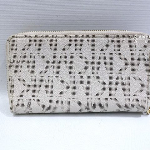 MK JET SET白色防刮牛皮手拿ㄇ拉對開長夾-3