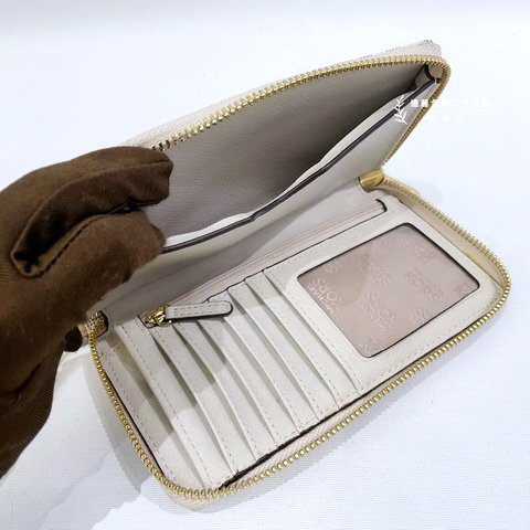 MK JET SET白色防刮牛皮手拿ㄇ拉對開長夾-6