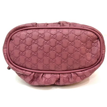 Gucci 粉色牛皮小G壓紋淡金釦拉鍊化妝包-5