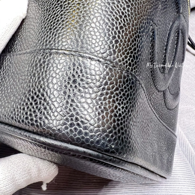 Chanel黑金荔枝皮化妝袋-17