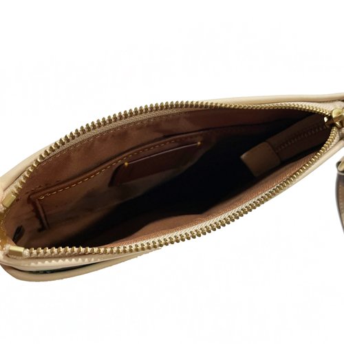 【全新】COACH 專櫃款字母C LOGO花卉印花小斜背包(花卉/粉膚)-4