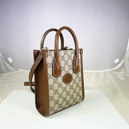 GUCCI 咖啡色 PVC INTERLOCKING G MINI琴譜包 671623-1