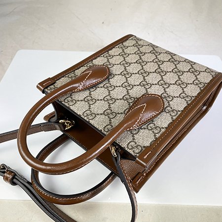 GUCCI 咖啡色 PVC INTERLOCKING G MINI琴譜包 671623-3