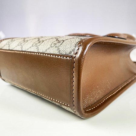 GUCCI 咖啡色 PVC INTERLOCKING G MINI琴譜包 671623-5