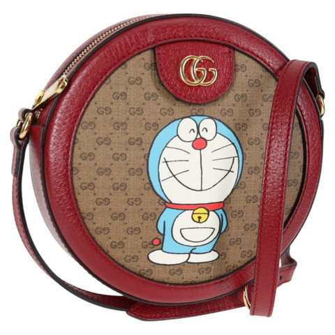 GUCCI GG Supreme 哆啦 A 夢合作款包款 PVC 米金色 625216 正品 120169M