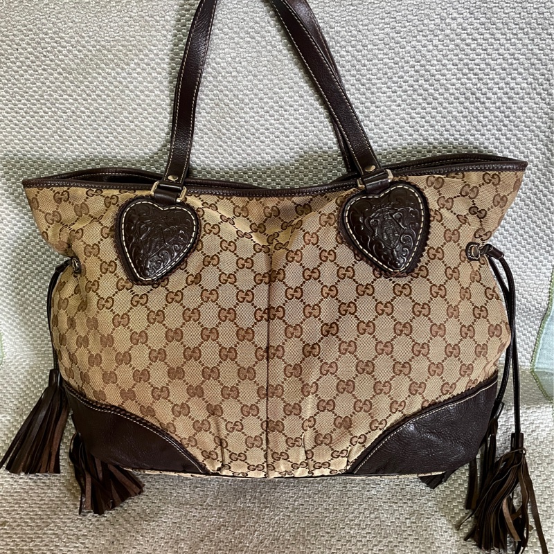 Gucci. 愛心小金人流蘇托特包-0
