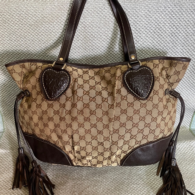 Gucci. 愛心小金人流蘇托特包-1