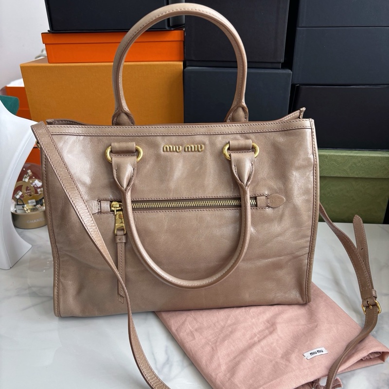 【全新閒置品】Miumiu 做舊牛皮機車包-0