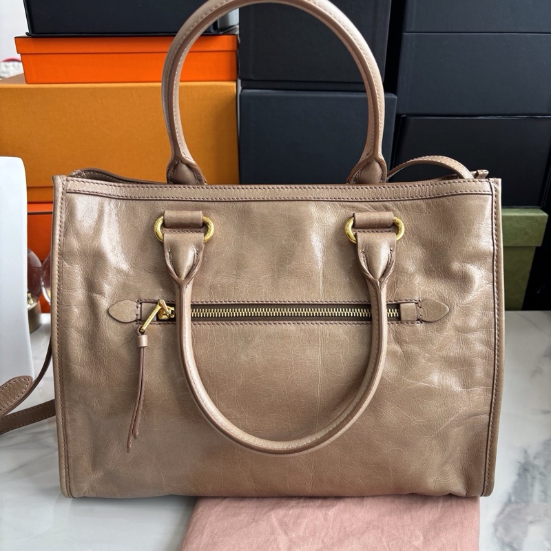 【全新閒置品】Miumiu 做舊牛皮機車包-1