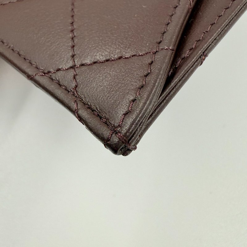 CHANEL-黑色淡金釦牛皮三折WOC-11