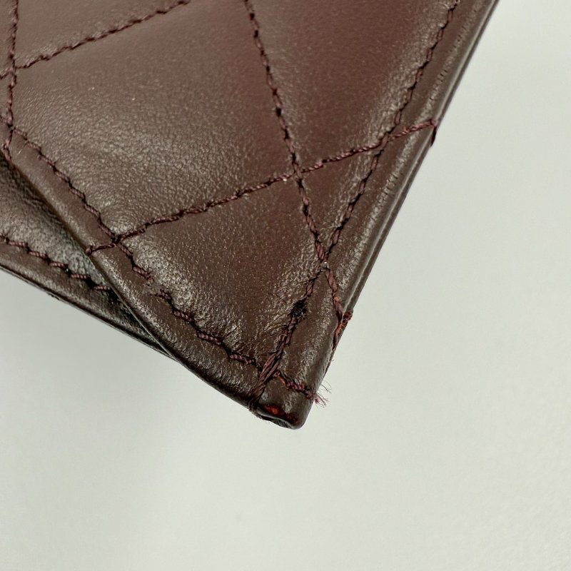 CHANEL-黑色淡金釦牛皮三折WOC-12