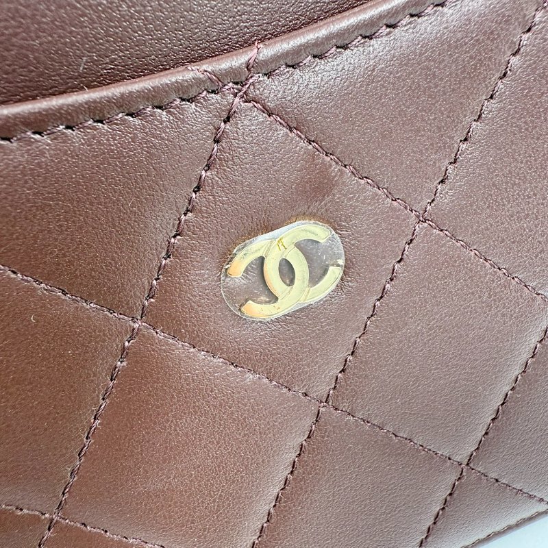 CHANEL-黑色淡金釦牛皮三折WOC-20