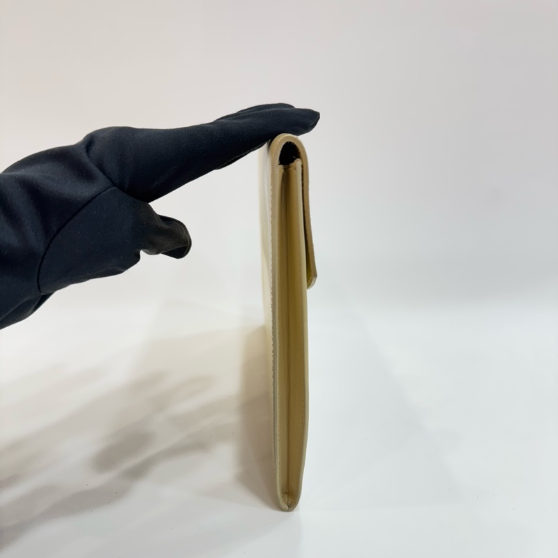 HERMES 奶白色牛皮鎖頭手拿包-4