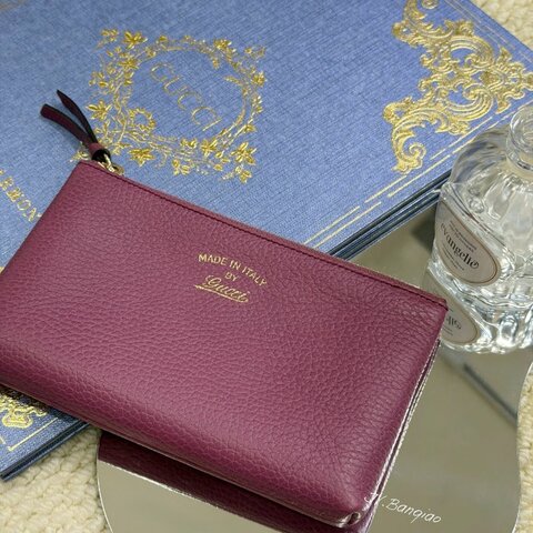 gucci桃紅牛皮金色草寫logo拉鍊小可愛806480512