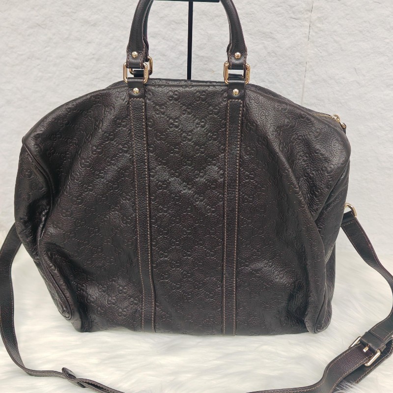 Gucci 古馳 黑色全皮老花壓紋旅行包-1