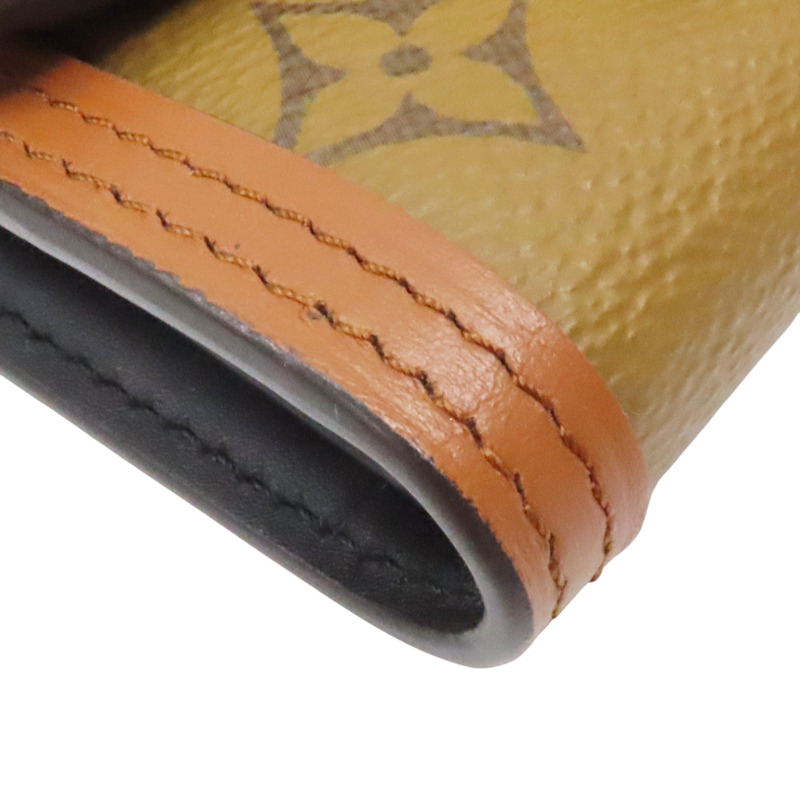 原花 Reverse 帆布 Dauphine 扣式短夾【LOUIS VUITTON LV 路易威登】 M68725-7