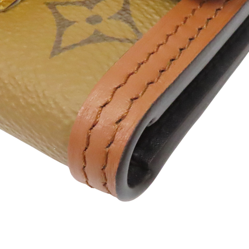 原花 Reverse 帆布 Dauphine 扣式短夾【LOUIS VUITTON LV 路易威登】 M68725-8