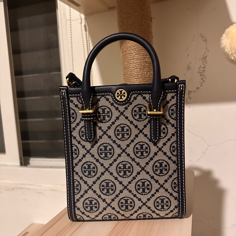 Tory Burch 經典復古藏藍老花琴譜包-8