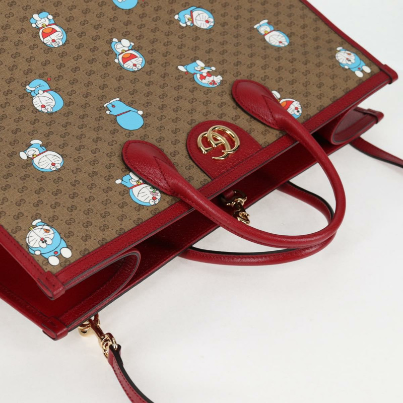 【日本直送】GUCCI 微型 GG Supreme 哆啦 A 夢手提包 PVC 兩用棕金色 653952 正品 131782A-5