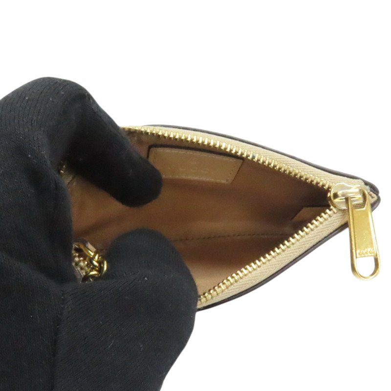 烏木色 GG Supreme 緹花帆布 Horsebit 零錢包 774340-4