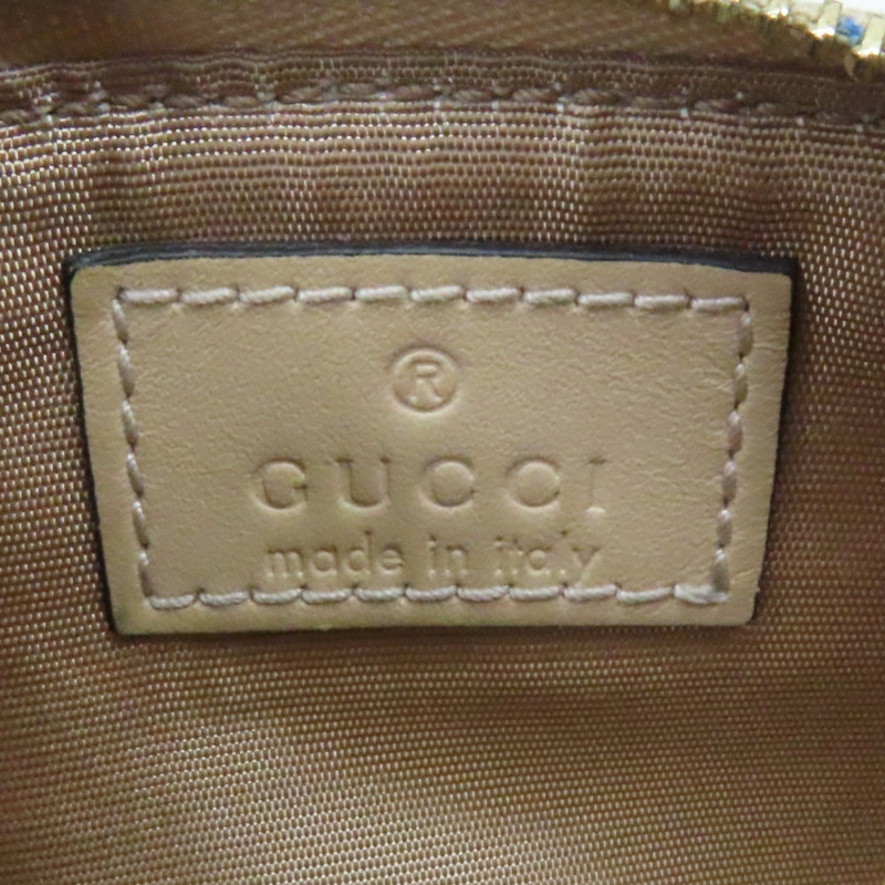 烏木色 GG Supreme 緹花帆布 Horsebit 零錢包 774340-5