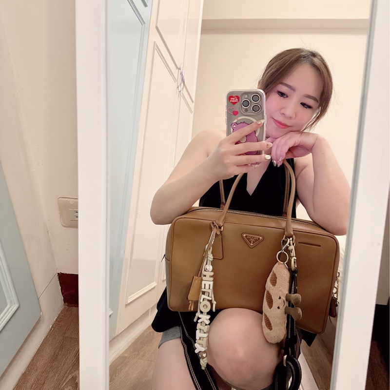 揹不到降價Prada plume30 送coach正品揹帶-7