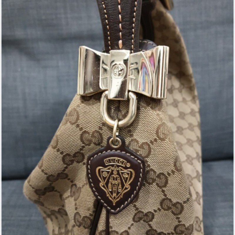 GUCCI HOBO雙蝴蝶結五金標誌設計肩背包，附贈原廠咖啡色絨布保護袋！-10