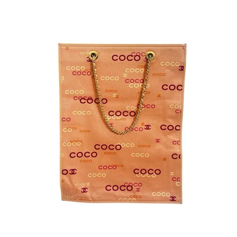CHANEL 粉紅色帆布COCO印花包