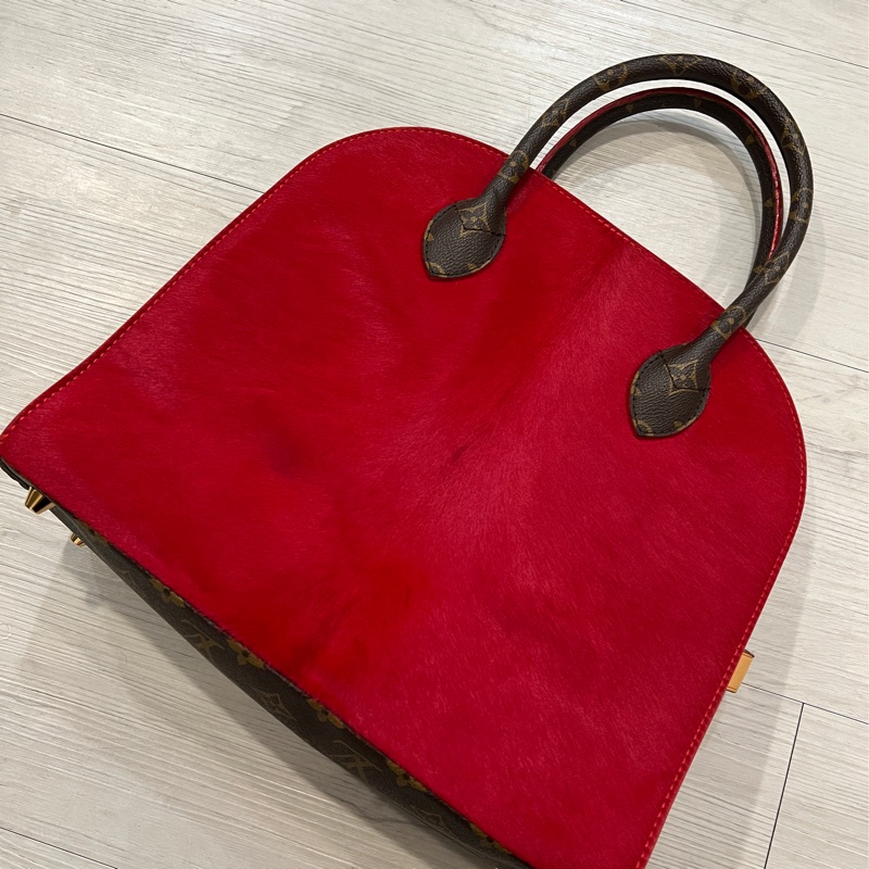 Louis Vuitton x Christian Louboutin 聯名款M41234 小馬皮革卯釘手提包-5