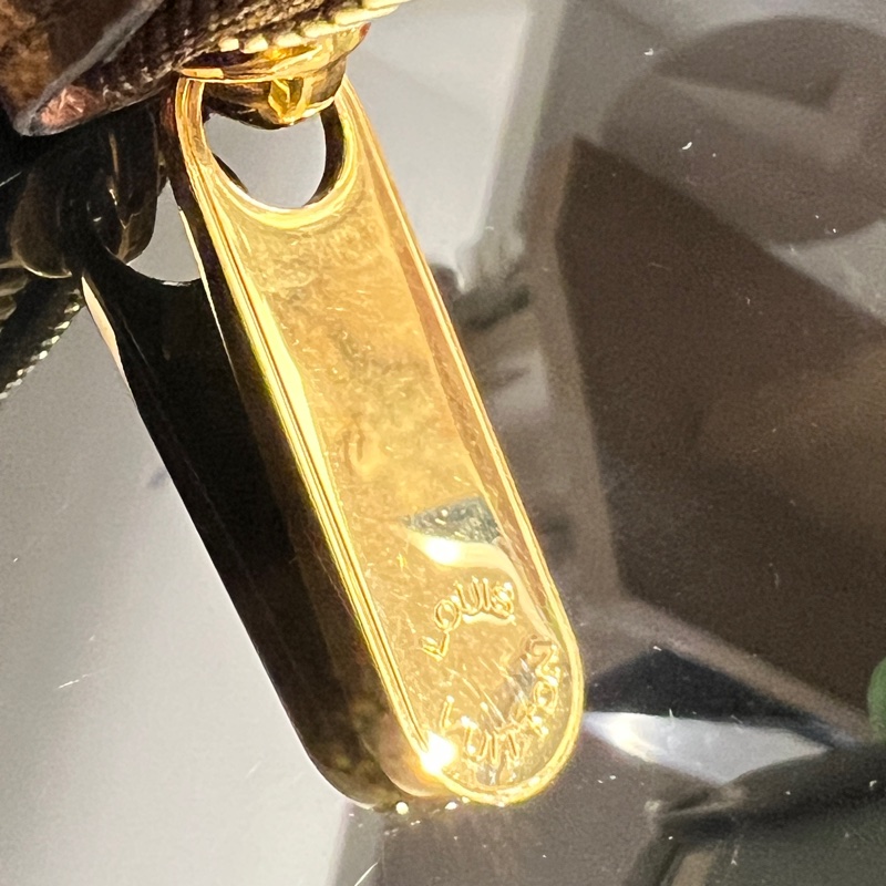 LV 原花金釦內12卡ㄇ拉長夾M42616-12