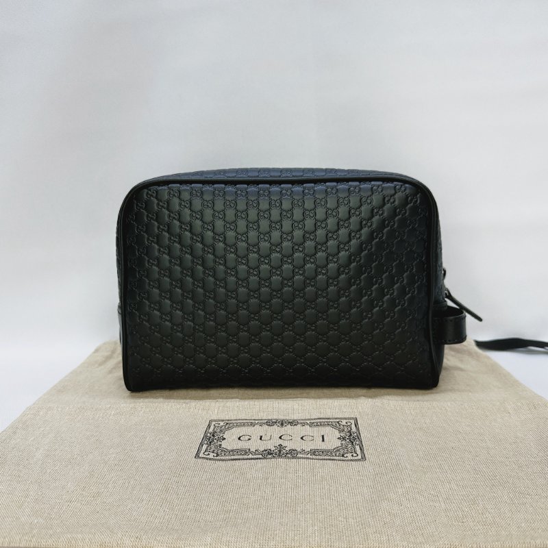GUCCI Guccissima皮革壓紋手拿包-1