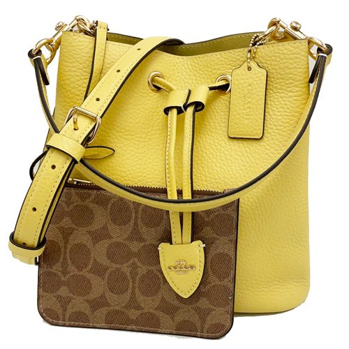 【全新】COACH 新款素面牛皮肩背斜背兩用束口水桶包(黃)-0