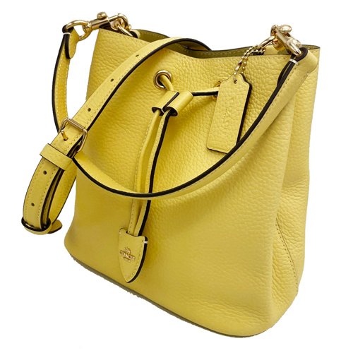 【全新】COACH 新款素面牛皮肩背斜背兩用束口水桶包(黃)-1