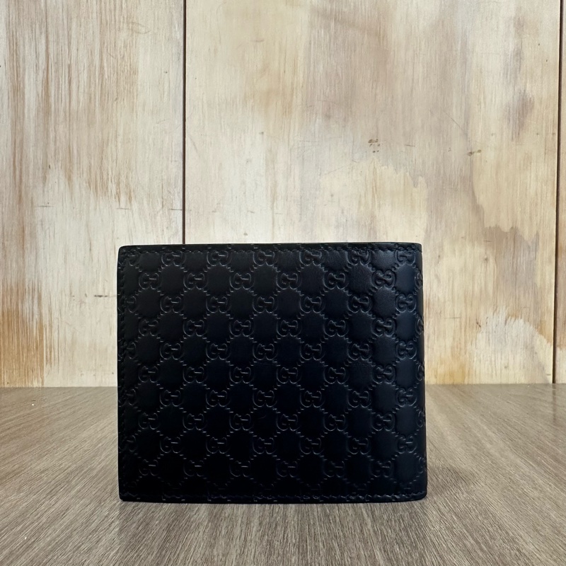 Gucci 260987 深藍GG壓紋對折短夾-1