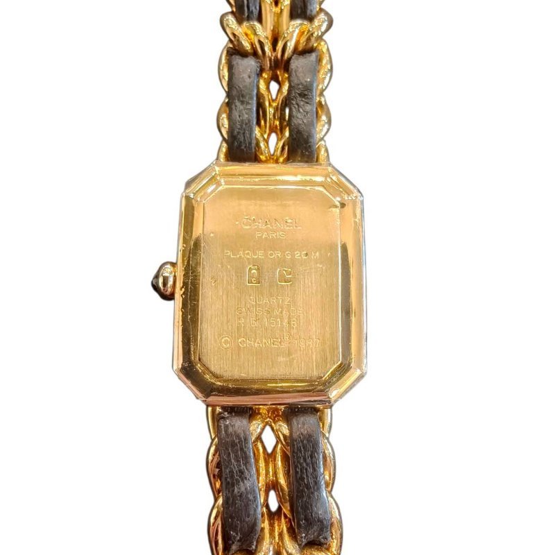 CHANEL 黑金皮穿首映石英錶S-7