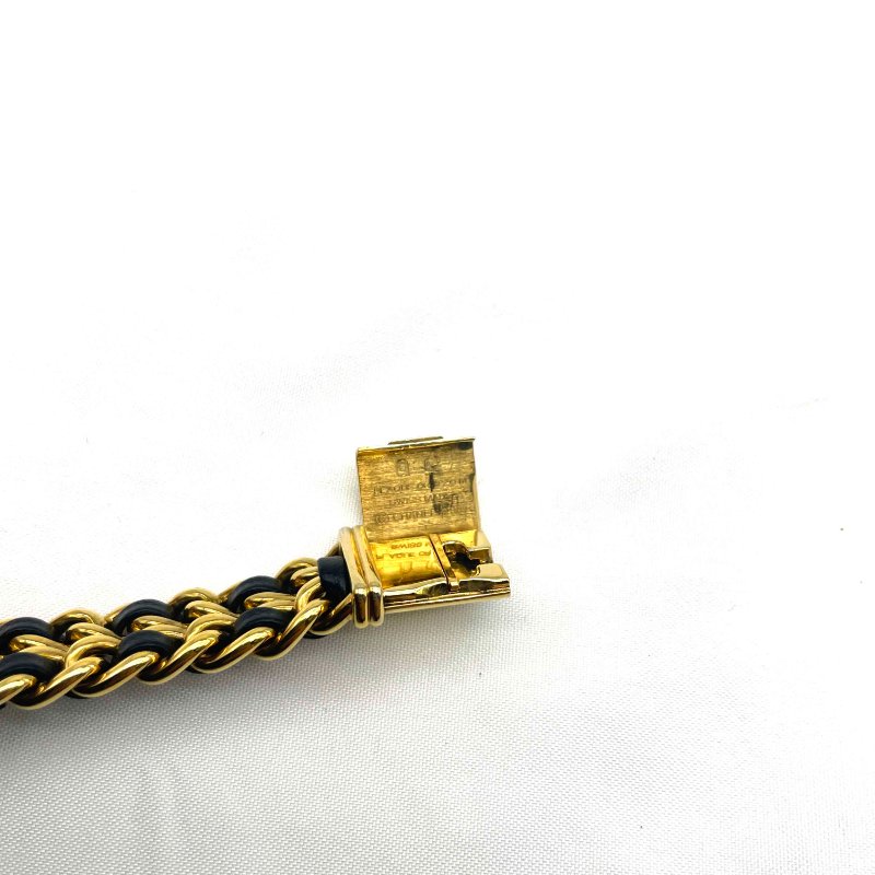 CHANEL 黑金皮穿首映石英錶S-5
