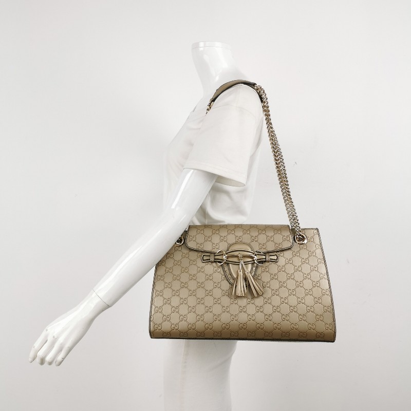 Gucci Emily 牛皮純色雙G壓紋流蘇馬銜扣單肩包-1
