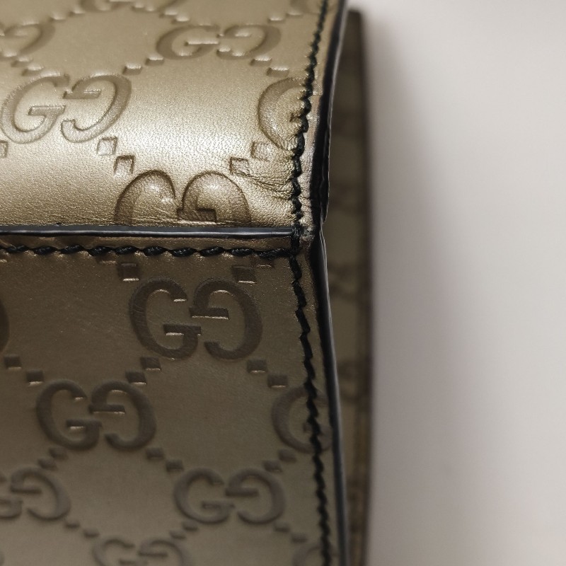 Gucci Emily 牛皮純色雙G壓紋流蘇馬銜扣單肩包-11