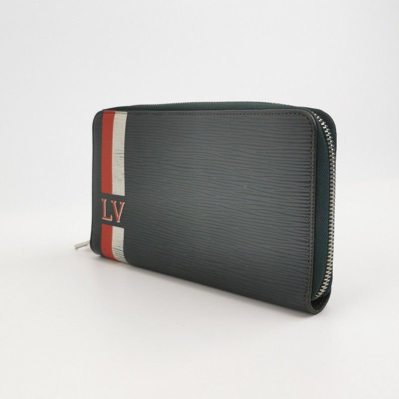 Louis Vuitton (LV) Zippy牛皮水波紋條紋Logo 環繞式拉鍊手拿包-1