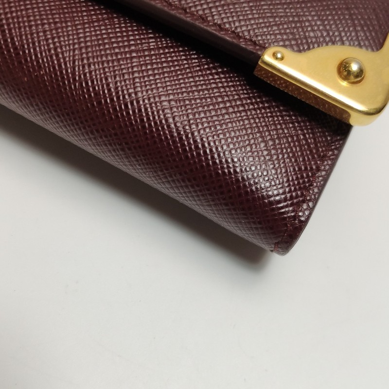 Prada Cahier牛皮純色字母Logo插扣錢包-16