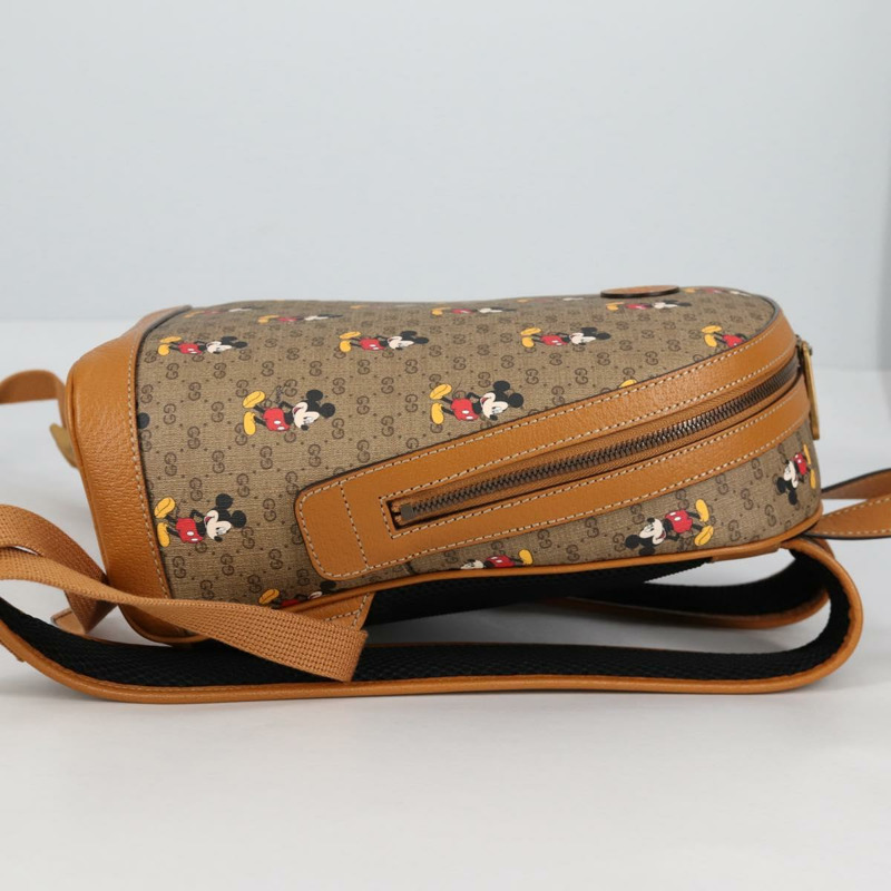 【日本直送】GUCCI GUCCIxDisney GG Supreme 雙肩包 PVC 米金色 552884 正品 140648M-3
